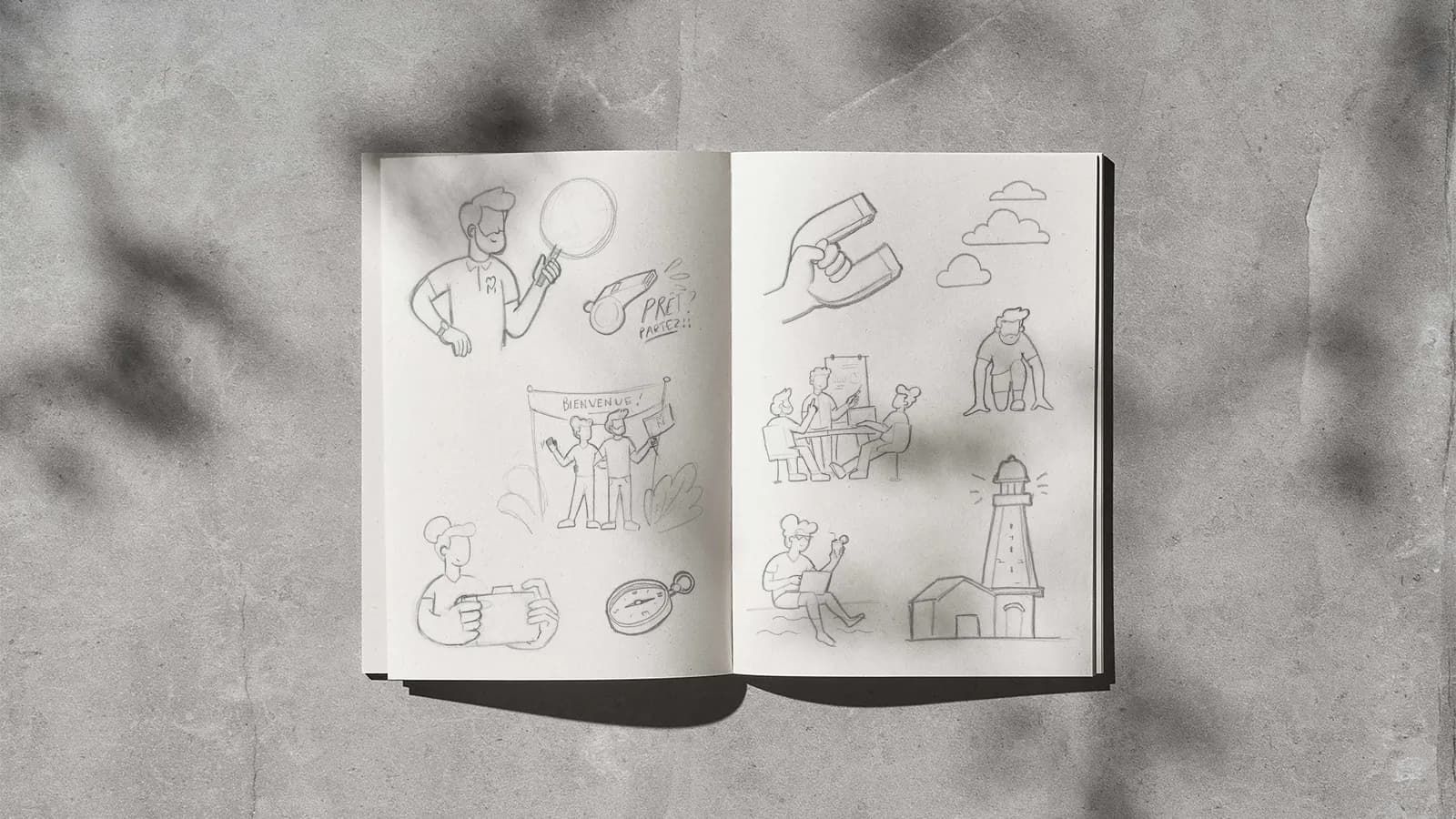 Carnet de croquis de recherche d'identite ouvert sur une table, Unik Studio